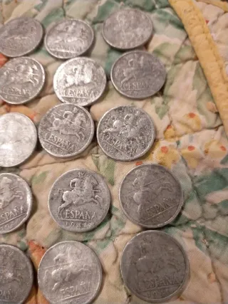 Lote 17 monedas España 10 céntimos años 40