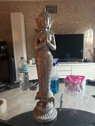 Figura decorativa plateada