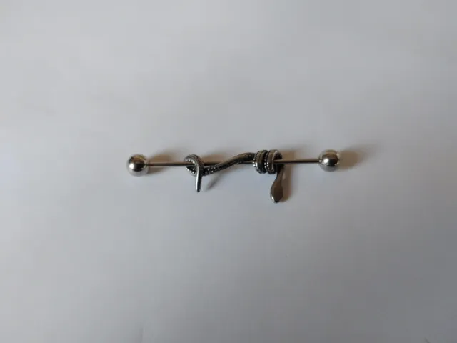 Piercing oreja industrial serpiente acero