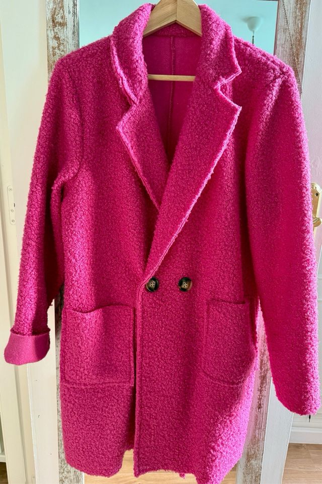 Abrigo de mujer rosa de lana