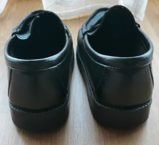 Zapatos negros tipo mocasín