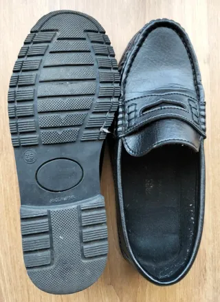 Zapatos negros tipo mocasín