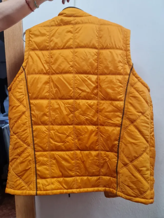 Chaleco acolchado naranja con cremallera