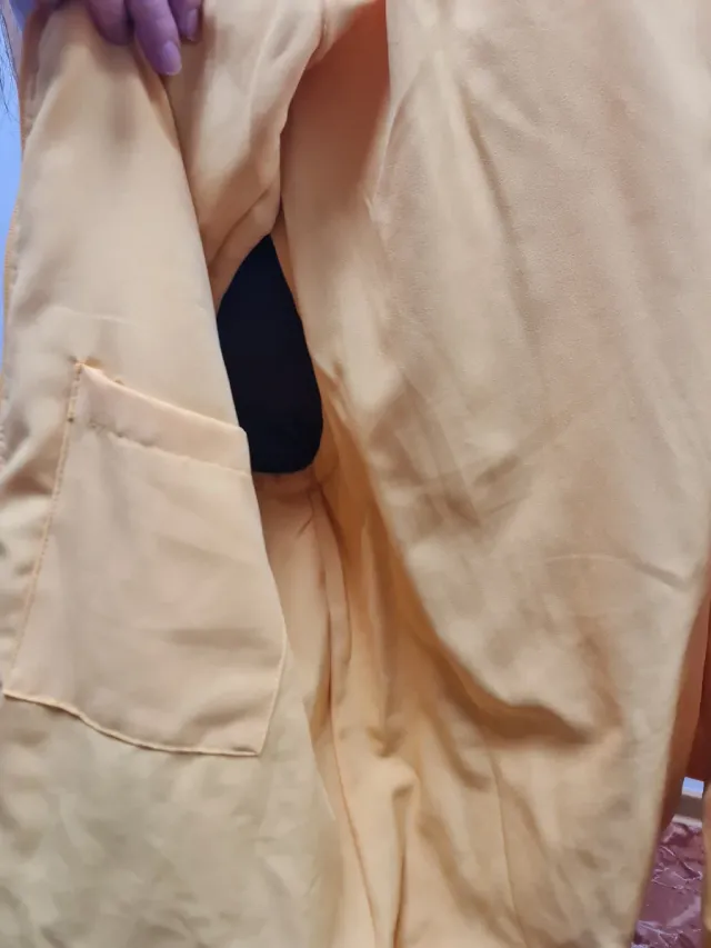 Chaleco acolchado naranja con cremallera