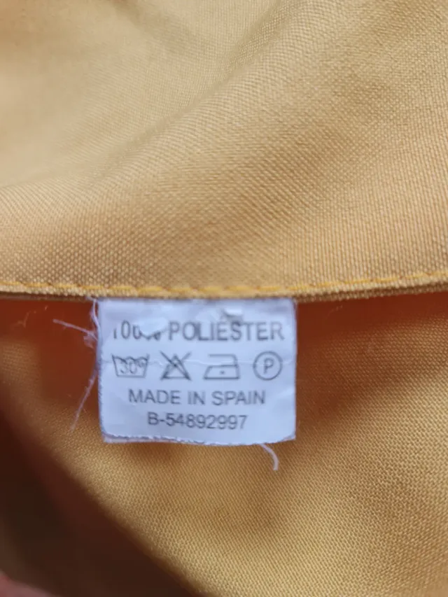 Chaleco acolchado naranja con cremallera