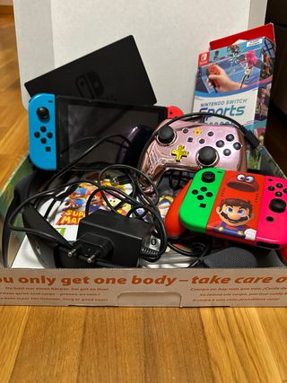 Nintendo Switch + 2 mandos + 3 juegos