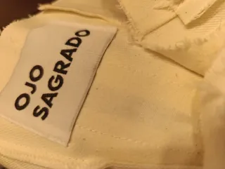 Top palabra de honor con plumas y cremallera poste