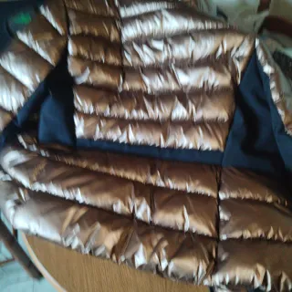 Chaqueta plumas bronce y negra, puesta 2 veces 40/