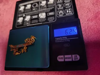 Esclava oro 18k con cadena y colgante