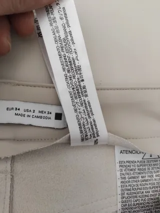 Pantaloni Zara similpelle color crema