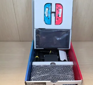 Nintendo Switch Rosso e Blu con giochi