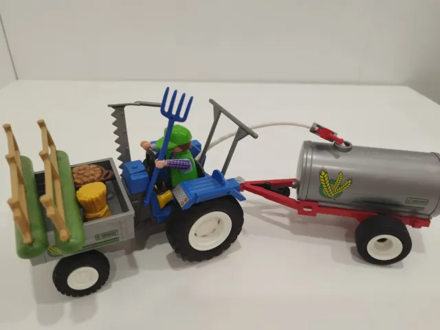 Tractor Playmobil con remolque y accesorios