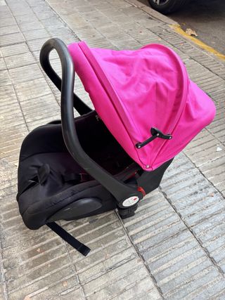 Carrito de bebé rojo con maxicosi y silla paseo