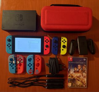 Nintendo Switch con 4 mandos y juego