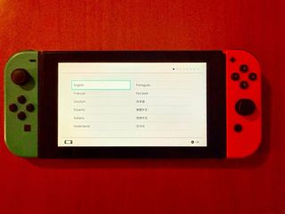 Nintendo Switch con 4 mandos y juego