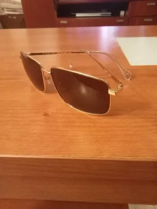 Gafas Cristal Verde Montura bañada en oro.