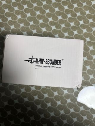 Apisonador de café con base ajustable