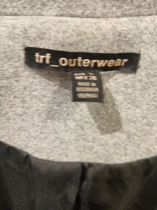 Abrigo gris doble botonadura