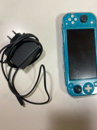 Nintendo Switch Lite + Caricabatterie + Minecraft