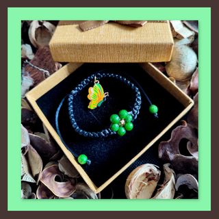 Pulsera macramé negro con flor verde – energía
