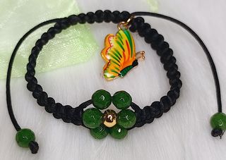 Pulsera macramé negro con flor verde – energía