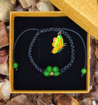 Pulsera macramé negro con flor verde – energía