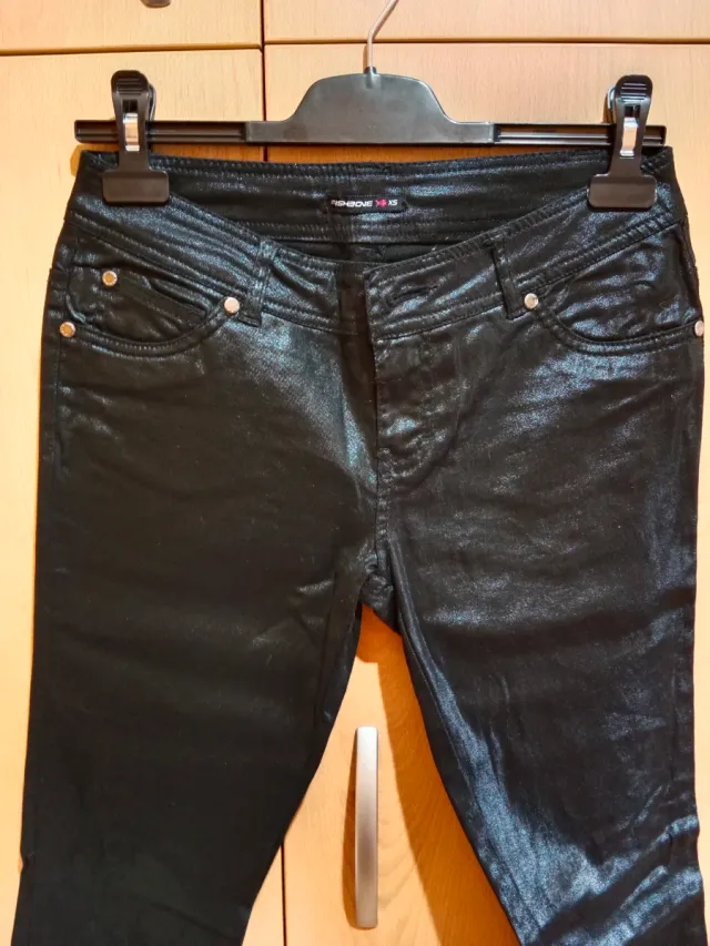 Pantalones negros brillantes talla XS