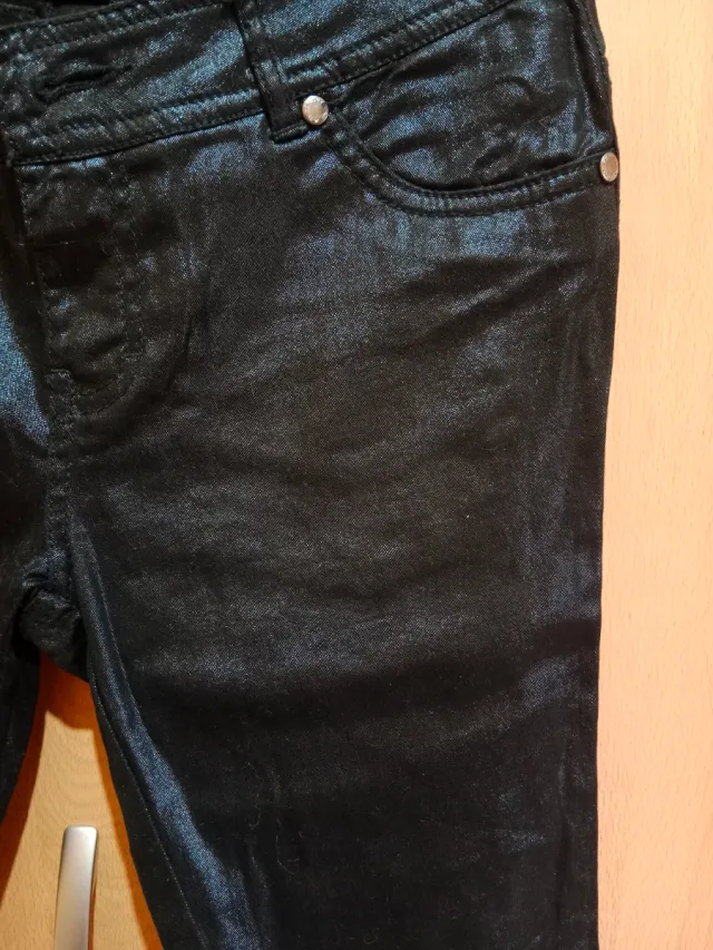 Pantalones negros brillantes talla XS