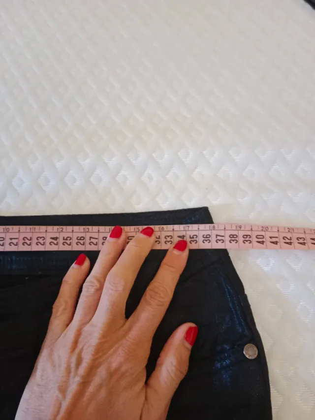 Pantalones negros brillantes talla XS