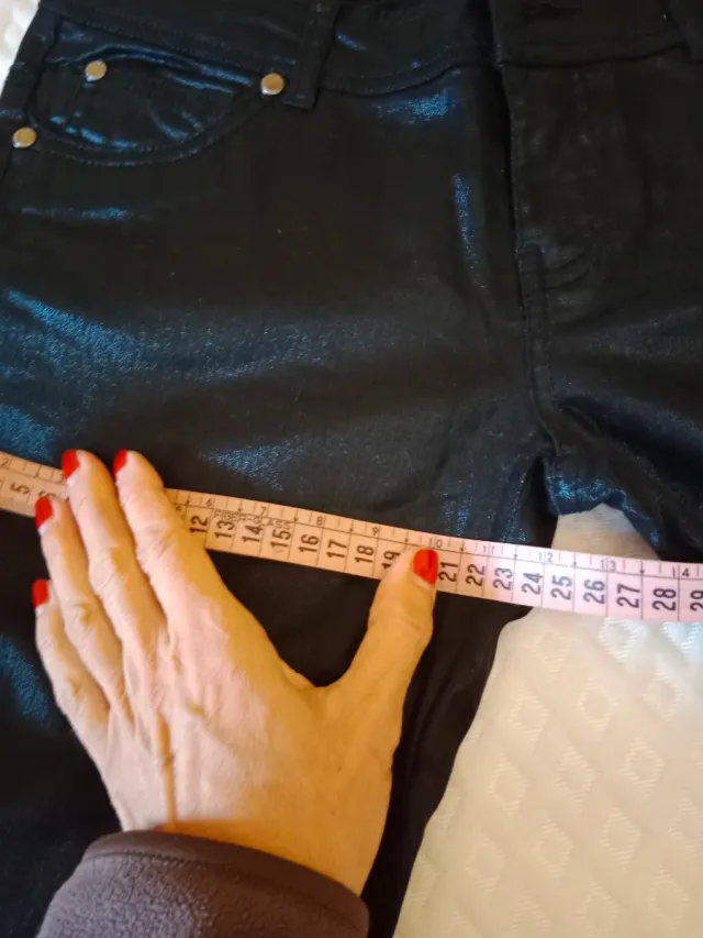 Pantalones negros brillantes talla XS