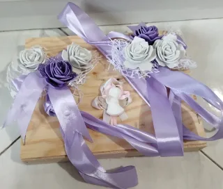 Nastri decorativi con fiori e angioletto