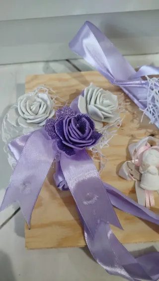 Nastri decorativi con fiori e angioletto