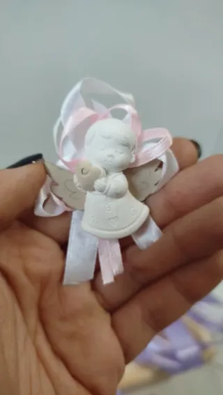 Nastri decorativi con fiori e angioletto