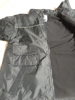 Parka de abrigo y de protección de mangas desmonta
