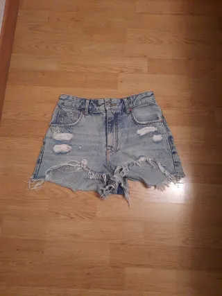 Vaqueros rotos cortos mujer