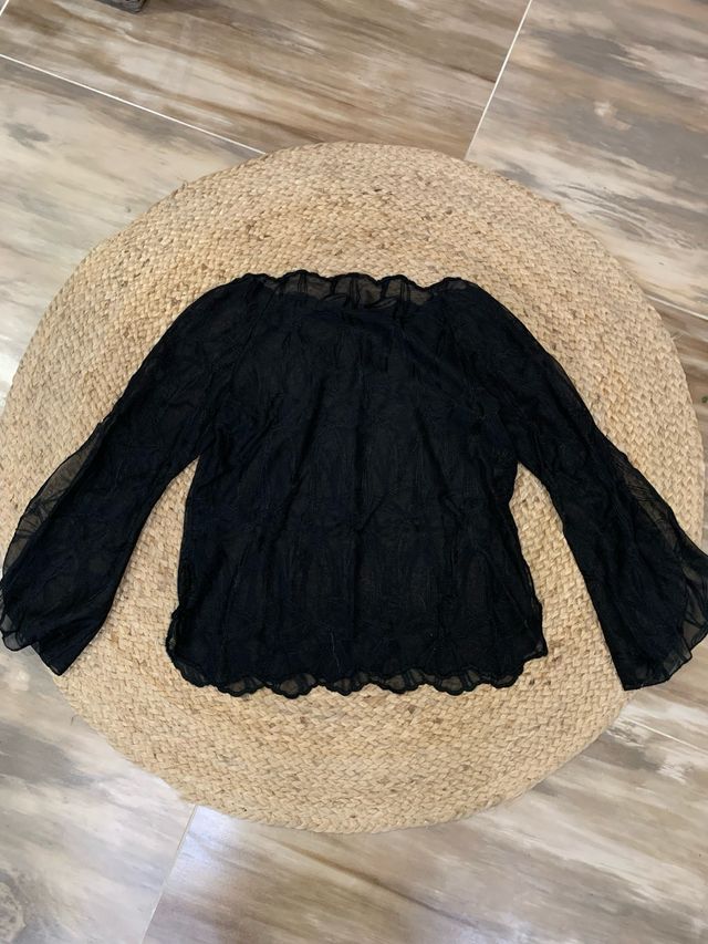 Blusa de transparencias negra