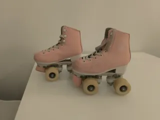 Patines artísticos Oxelo rosas talla 31