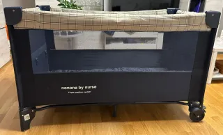 Cuna de viaje azul con bolsillo