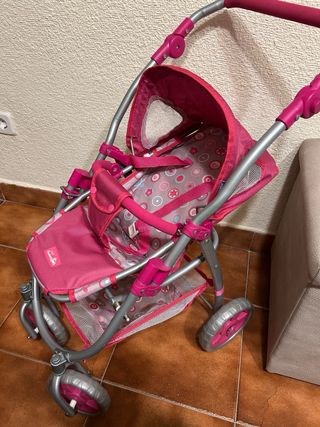 Silla de paseo para muñeca rosa