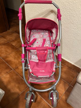 Silla de paseo para muñeca rosa