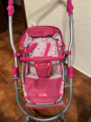 Silla de paseo para muñeca rosa