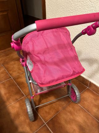 Silla de paseo para muñeca rosa