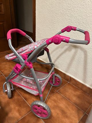 Silla de paseo para muñeca rosa