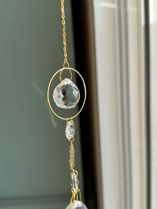 Cataluce a doppio sole in cristallo e metallo dorato