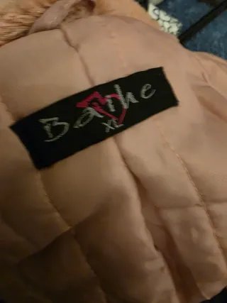 Abrigo de pelo rosa.