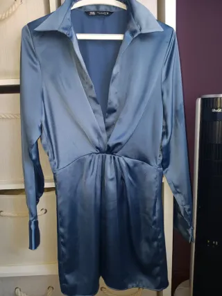 Gabardina 55€ y el vestidos lo regalo