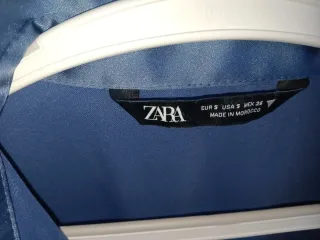 Gabardina 55€ y el vestidos lo regalo