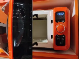 Microondas Naranja Marca Candy