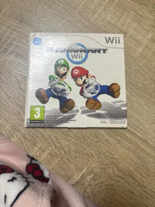 Nintendo Wii Mini Roja y juego Mario Kart