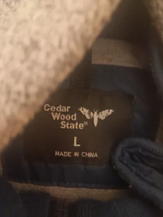 Abrigo azul y gris con capucha